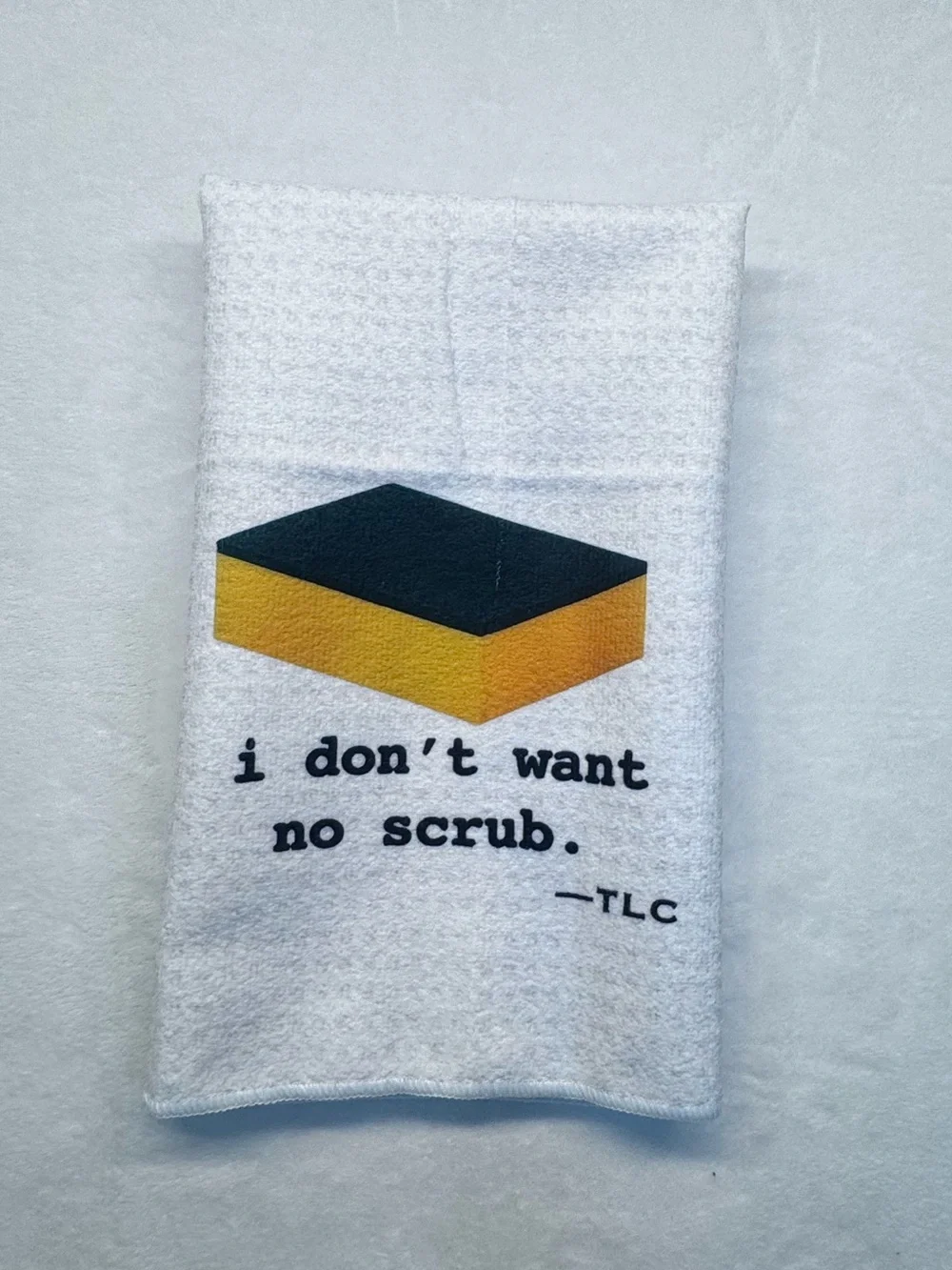 TLC White Kitchen Towel with Yellow and Dark Green Sponge Graphic